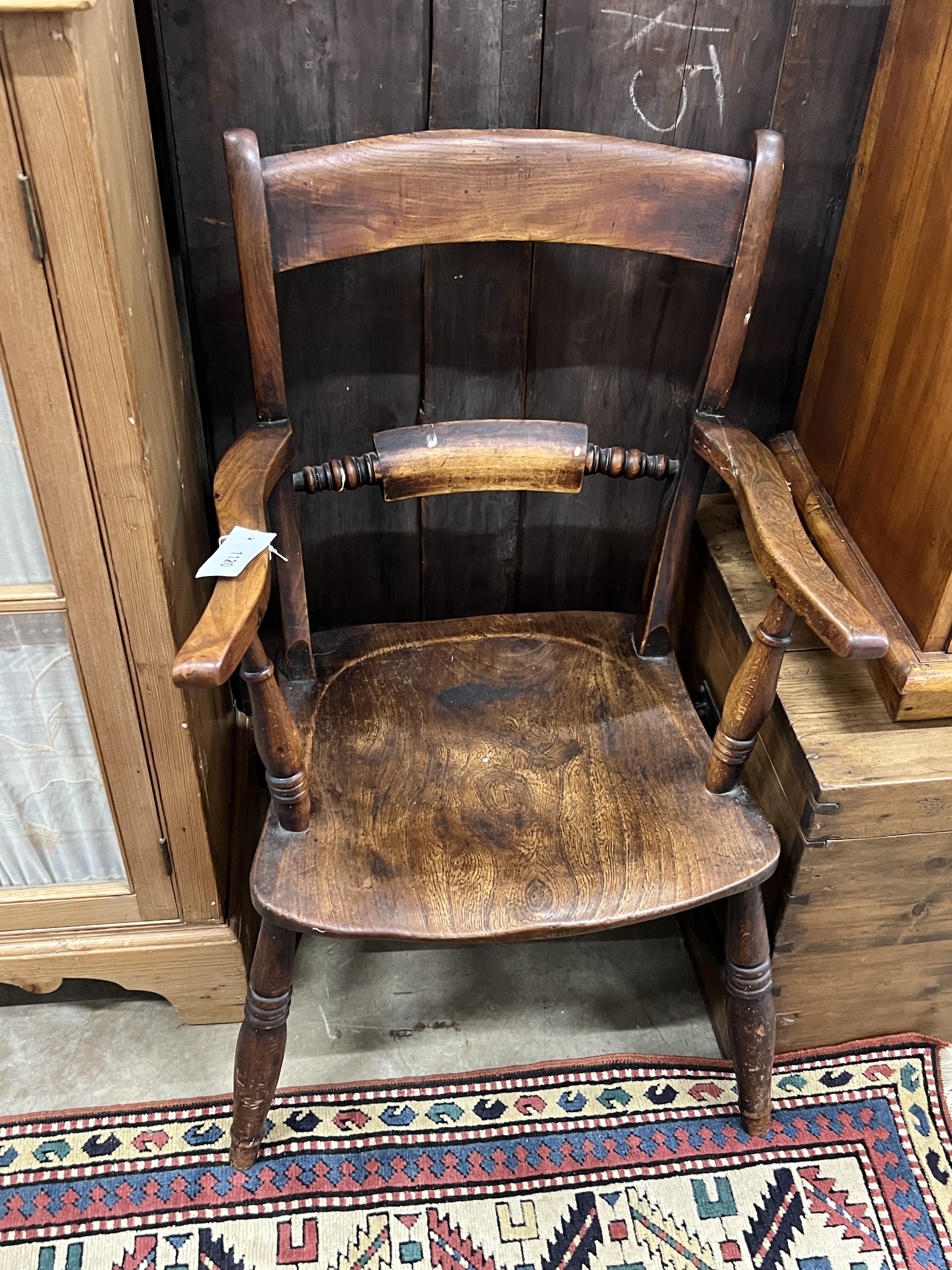 A Victorian elm and beech Windsor elbow chair, width 52cm, depth 40cm, height 87cm